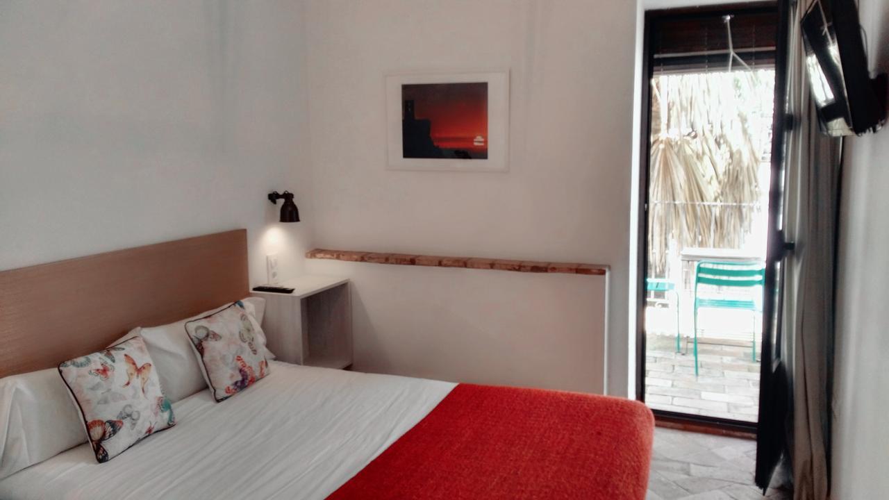 Frenteabastos Suites Cafe Hostal & Apartments Carmona  Eksteriør bilde